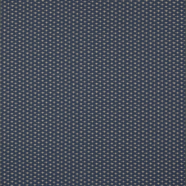Close-up of a small navy geometric woven fabric with pale flecks