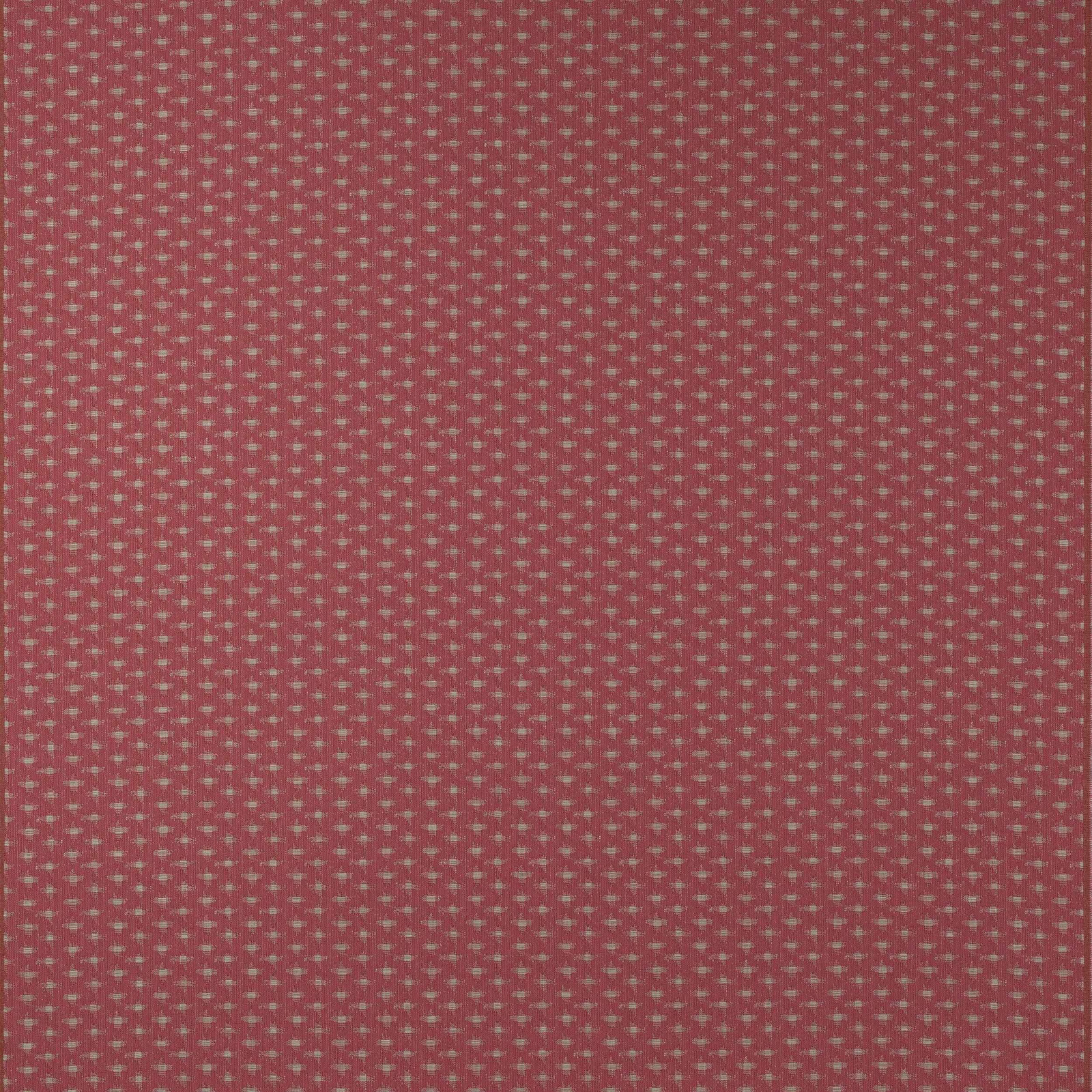 Close-up of dusty berry pink geometric woven fabric with tiny repeat