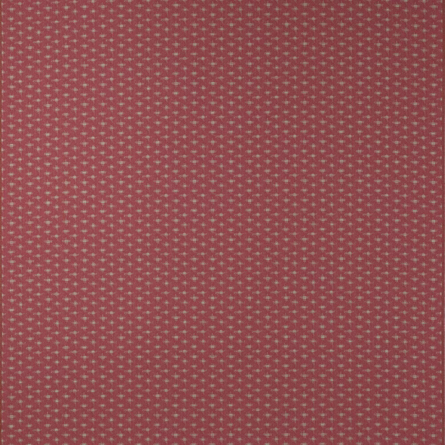 Close-up of dusty berry pink geometric woven fabric with tiny repeat