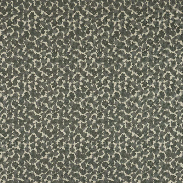 Muted celadon and cream abstract woven fabric with small irregular pattern