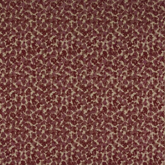 Dense mottled fuchsia, berry and blush woven fabric swatch
