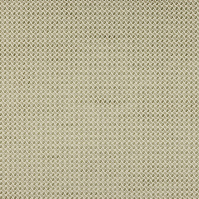 Close-up of a warm beige small-scale geometric woven fabric