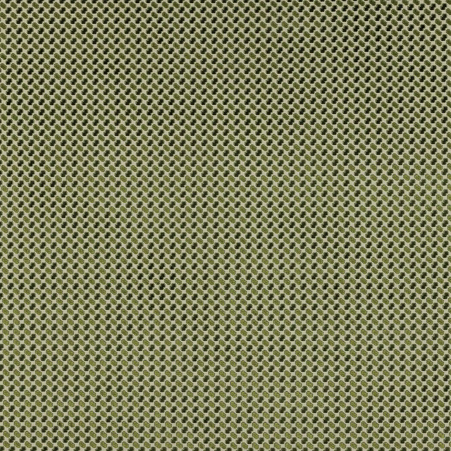 Close-up of mossy olive geometric woven fabric with tiny repeating dots