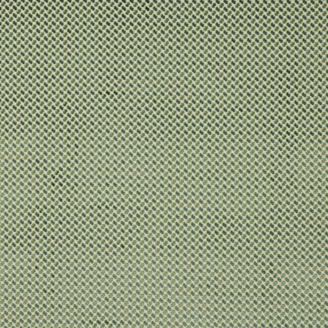 Small green geometric pattern on a pale cream fabric swatch