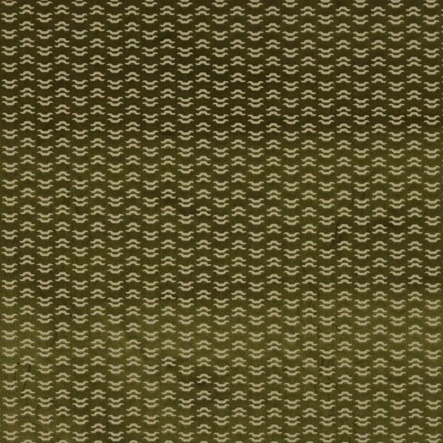 Olive green patterned fabric with small cream geometric repeats