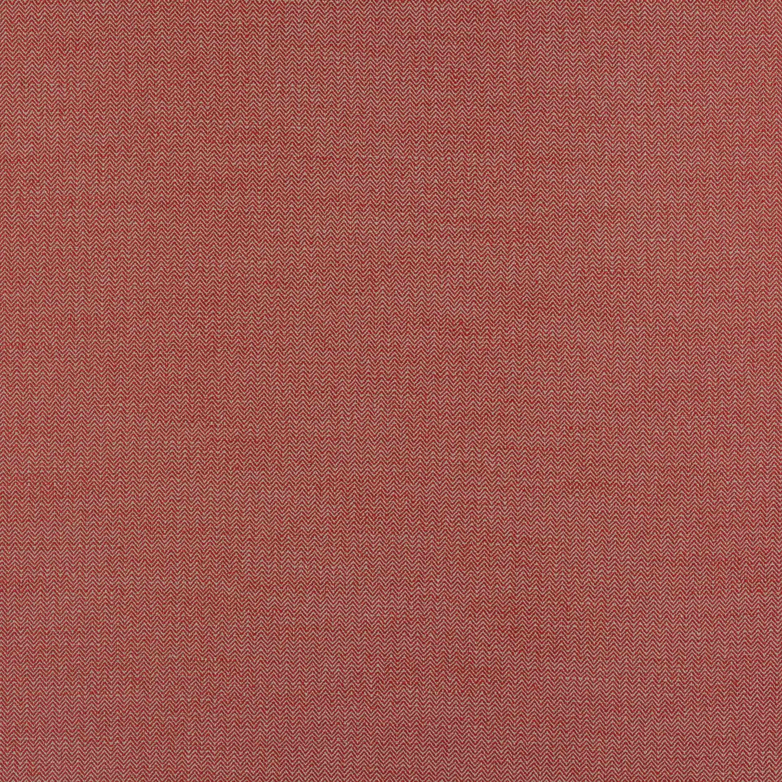 Close-up of a muted terracotta red linen with fine herringbone zigzag weave