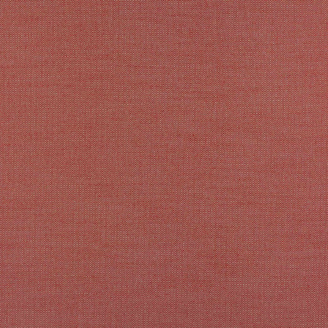 Close-up of a muted terracotta red linen with fine herringbone zigzag weave