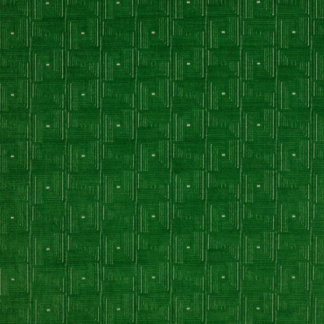 Emerald green geometric woven fabric with small square motifs and tiny pale flecks