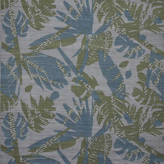 Blue and sage palm-leaf silk fabric on a pale grey ground with textured sheen