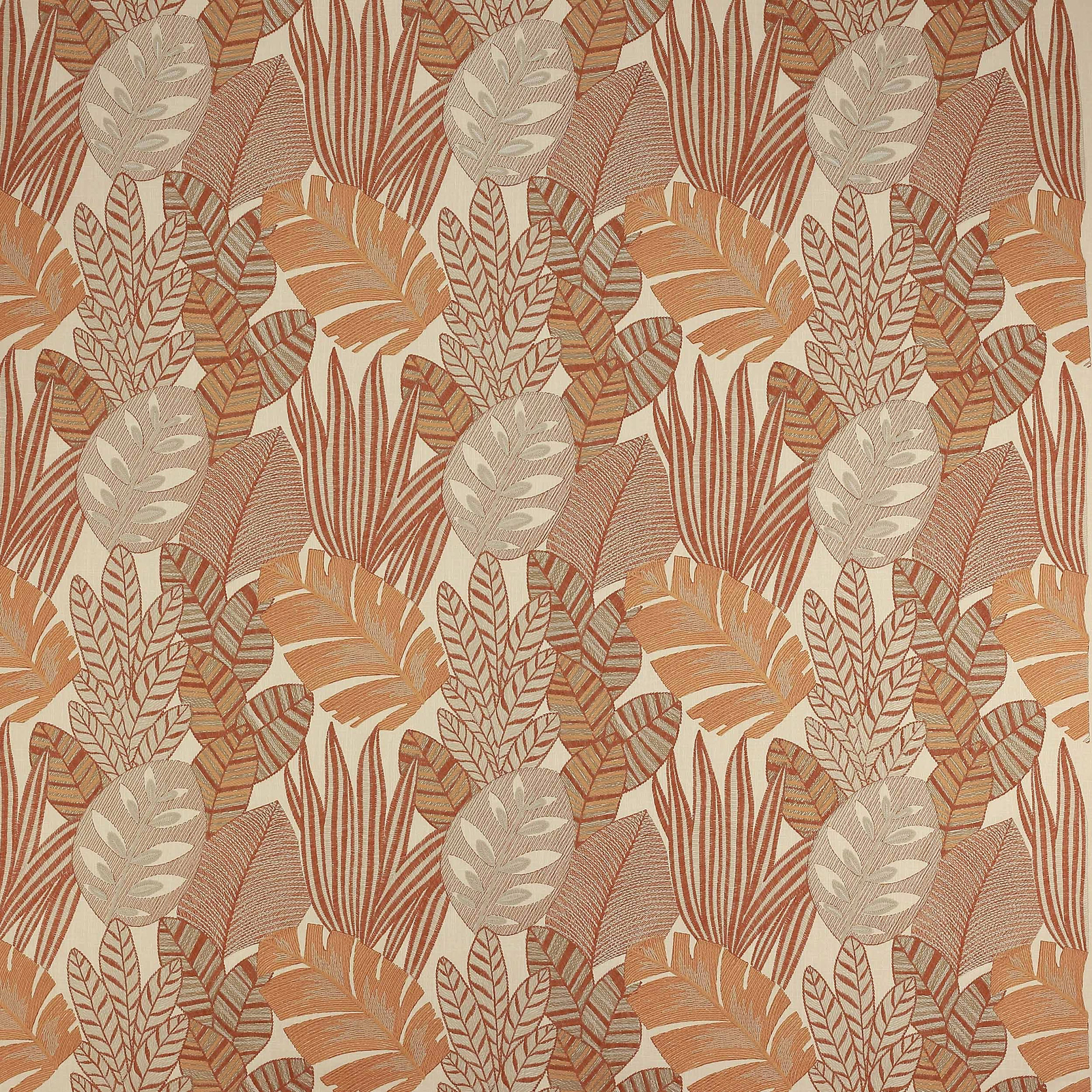Warm camel botanical fabric with layered leaf motifs and oat highlights