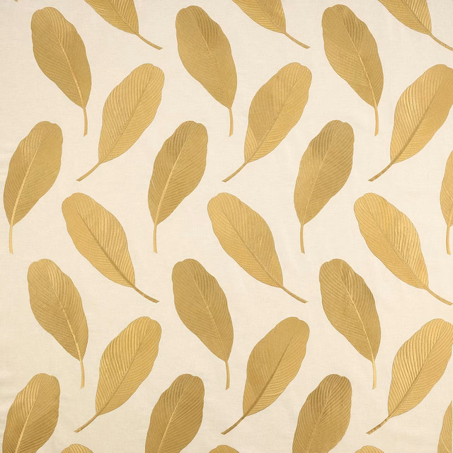 Cream fabric with repeating soft honey-gold leaf motifs and fine vein detail