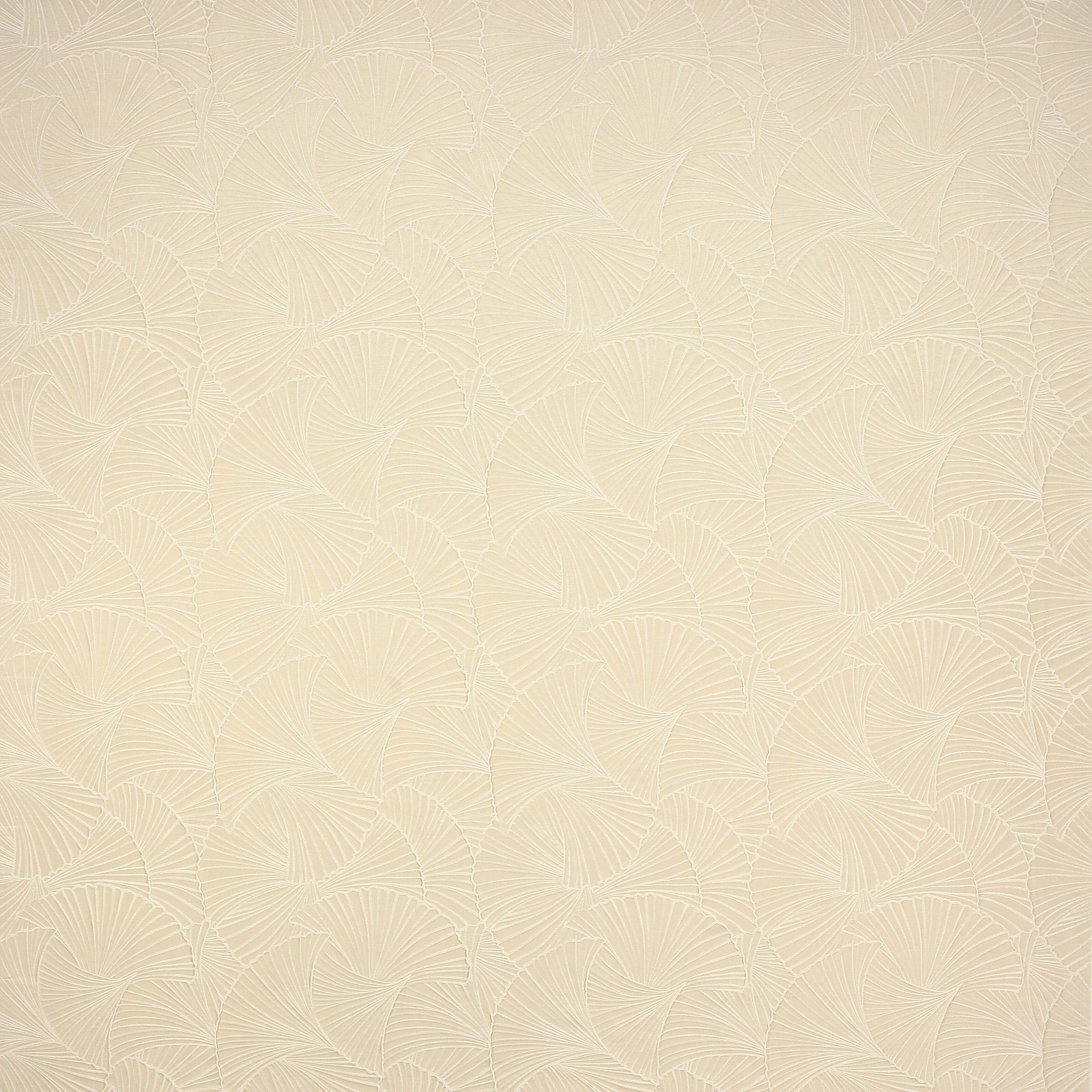 Pale cream textured fabric with a raised fan-like geometric weave
