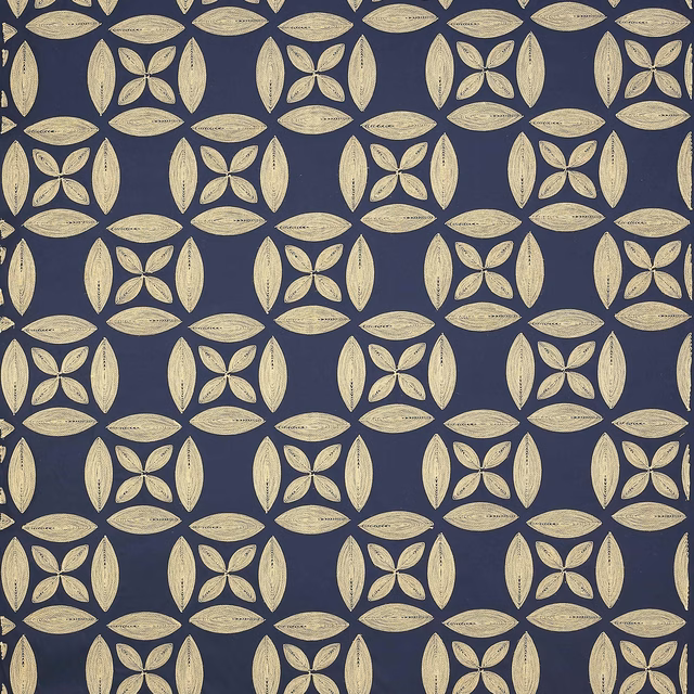 Midnight blue geometric fabric with pale ivory petal motifs in a woven texture