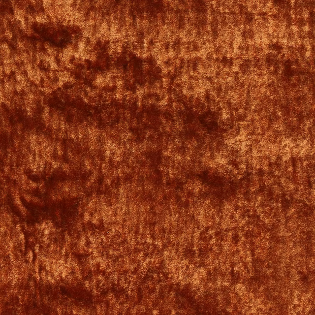 Antique red velvet-like fabric with coppery highlights and mottled texture
