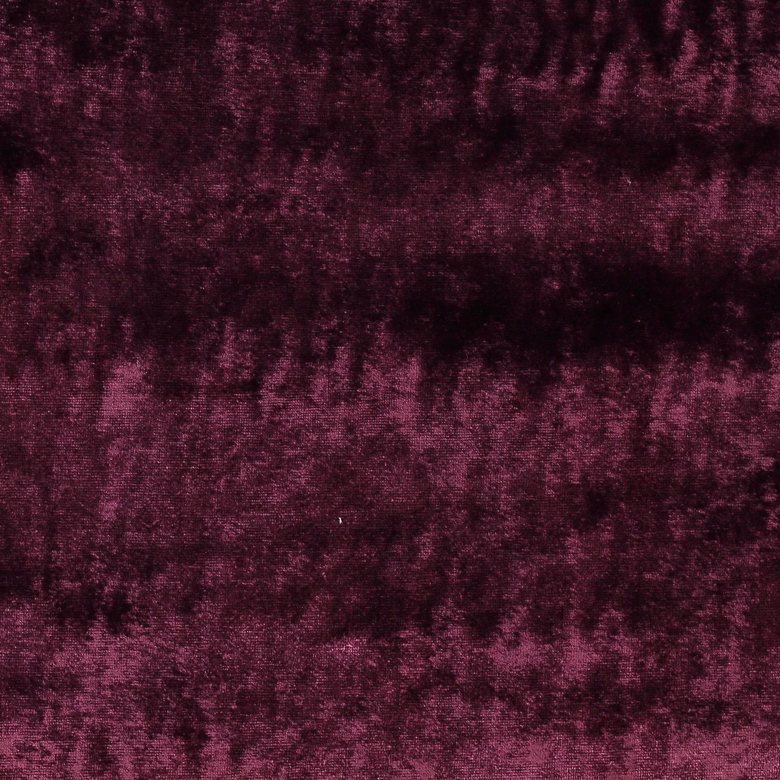 Dark aubergine plum fabric with a soft mottled, velvety texture
