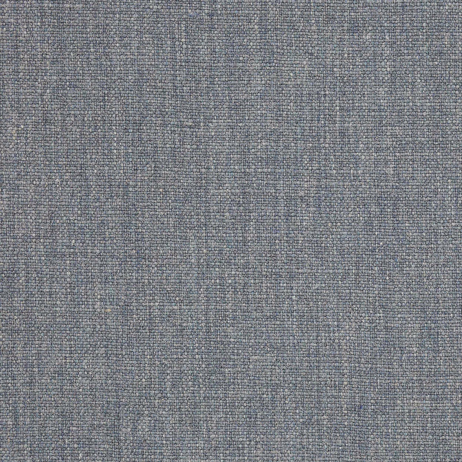 Close-up of a soft slate blue woven fabric with fine speckled texture
