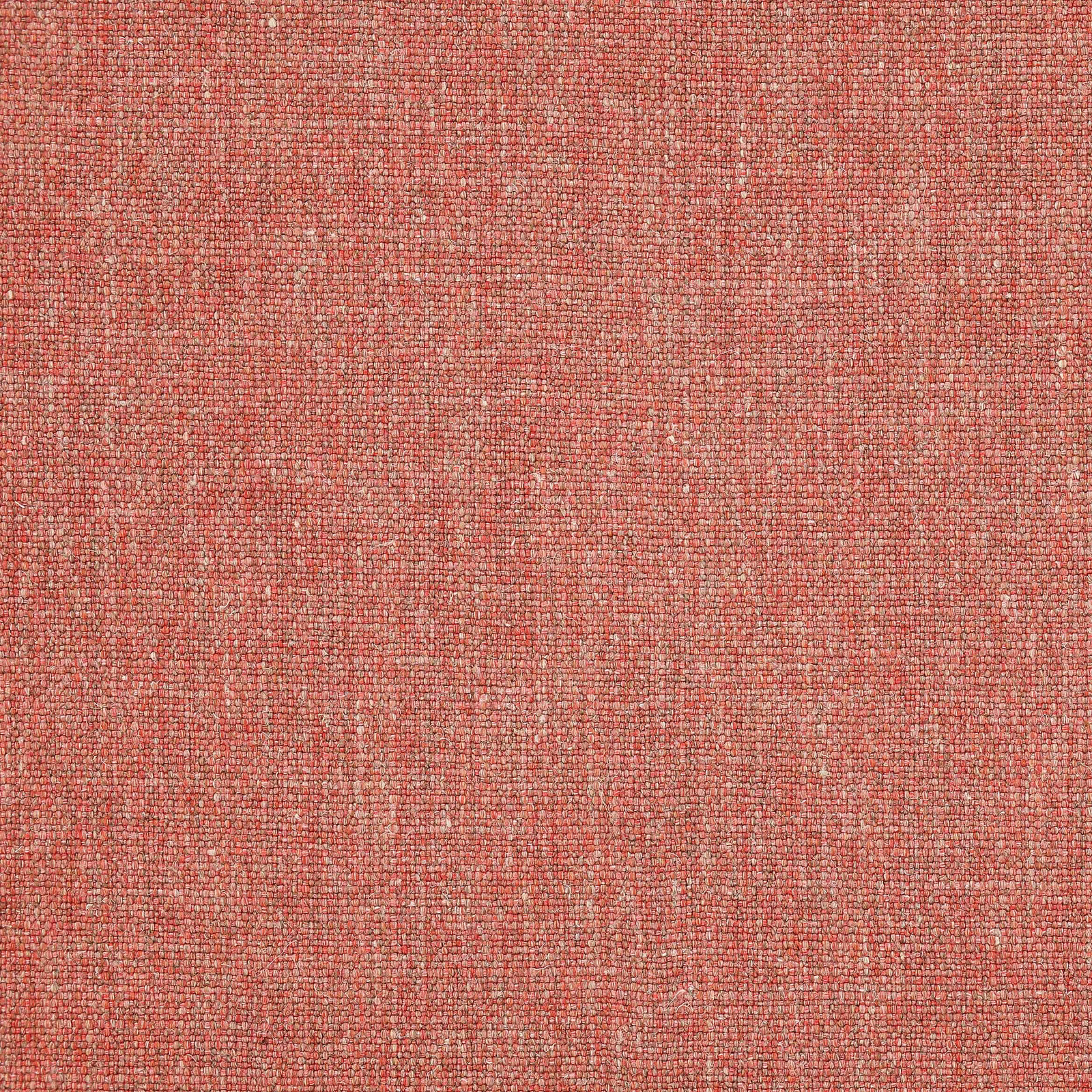 Soft coral-red woven fabric with a fine slubbed texture