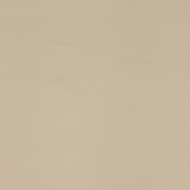 Warm bone cream plain cotton fabric with a soft, finely woven surface