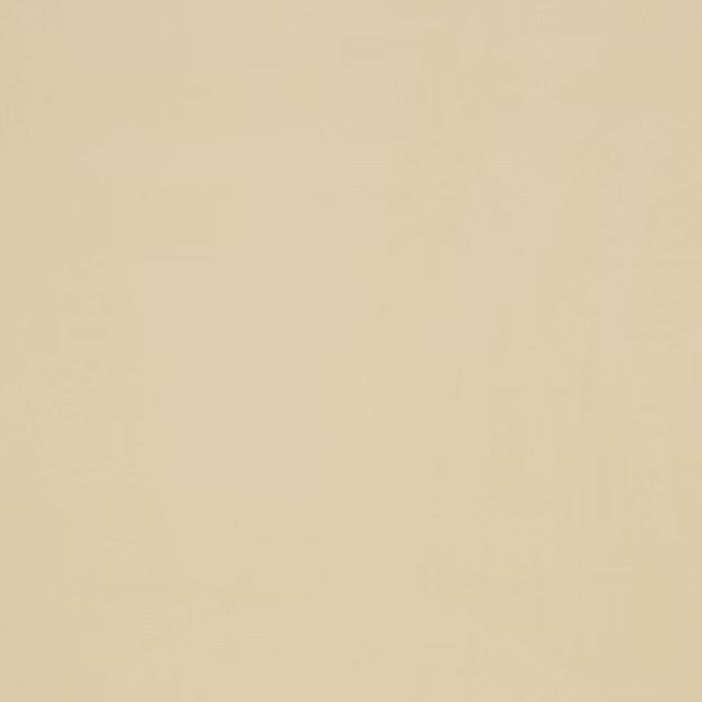 Plain soft ivory cotton fabric swatch with a smooth matte surface