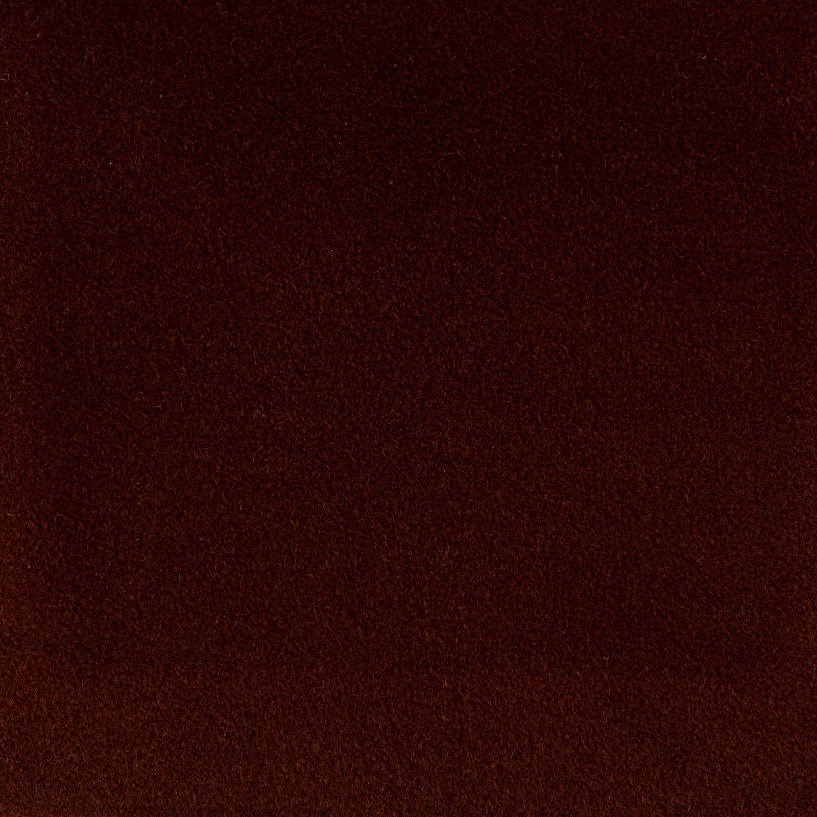 Deep burnt spice cotton fabric with a fine speckled woven texture