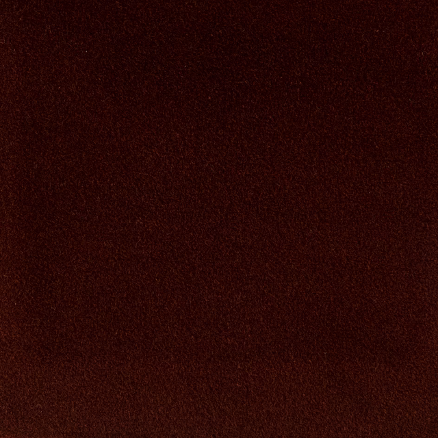 Deep burnt spice cotton fabric with a fine speckled woven texture