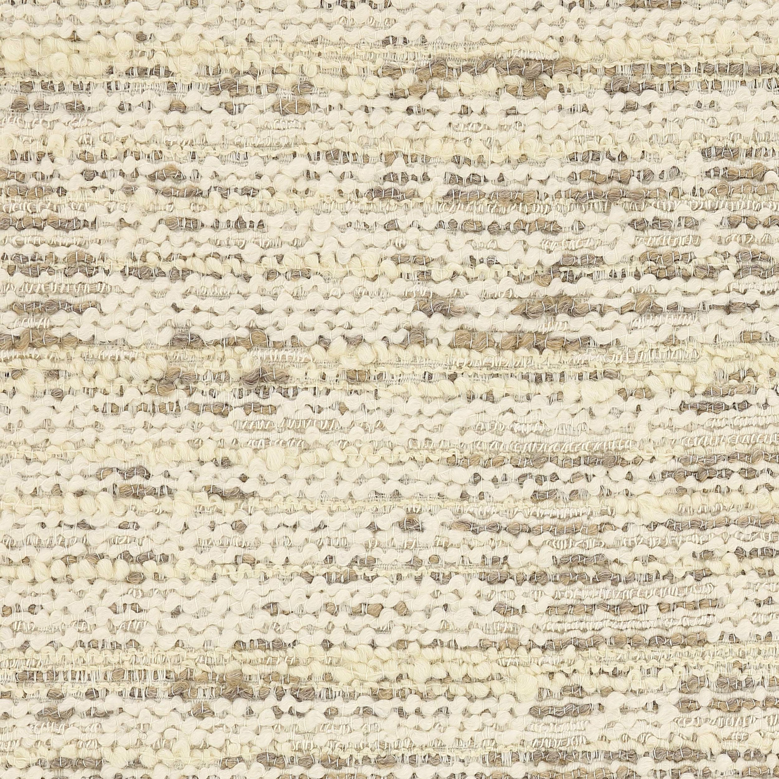 Close-up of a warm cream slubbed weave with beige and taupe flecks