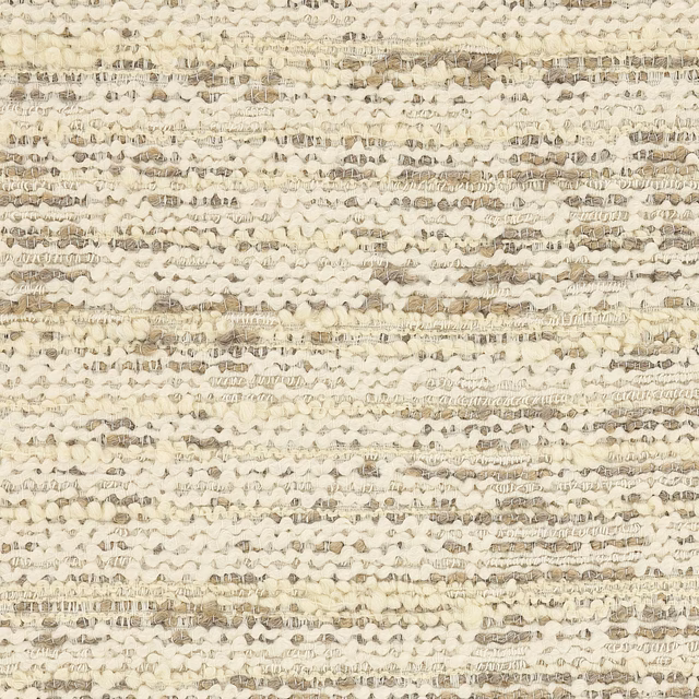 Close-up of a warm cream slubbed weave with beige and taupe flecks