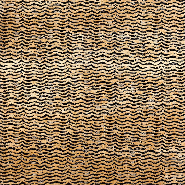Close-up of warm ebony and tan wavy zigzag striped fabric