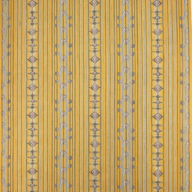 Golden tobacco fabric with narrow vertical stripes and small geometric diamond motifs