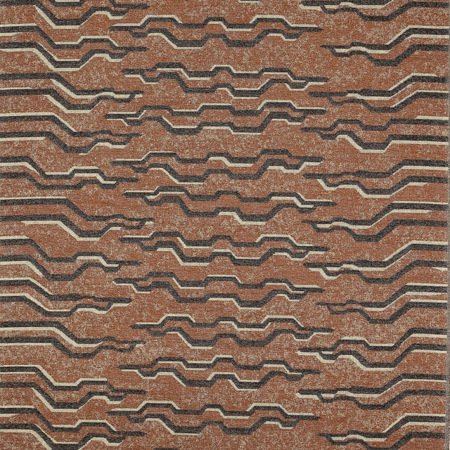 Terracotta geometric woven fabric with stepped charcoal and cream zigzag bands