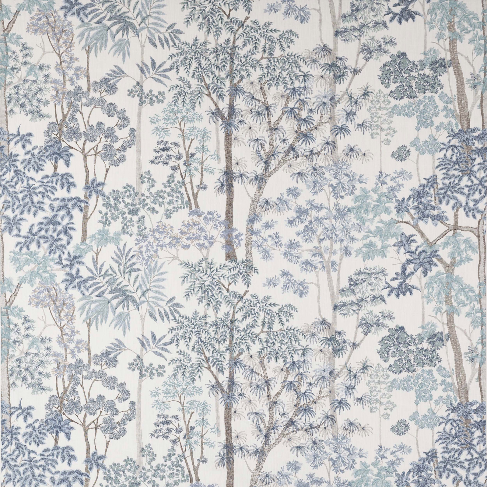 Blue woodland tree print on ivory fabric with fine leafy branches