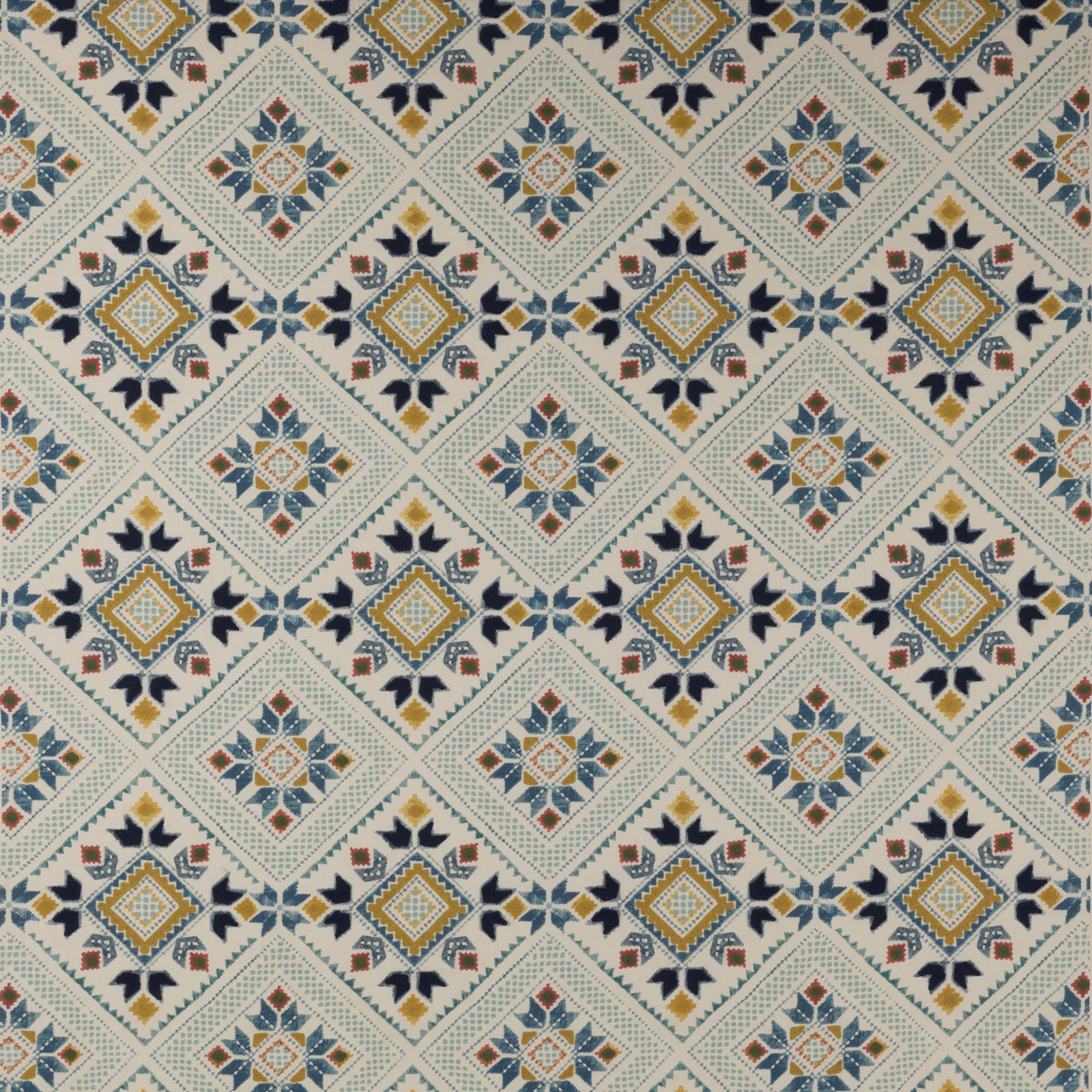 Diamond geometric fabric swatch in pale blue, ochre, navy and terracotta