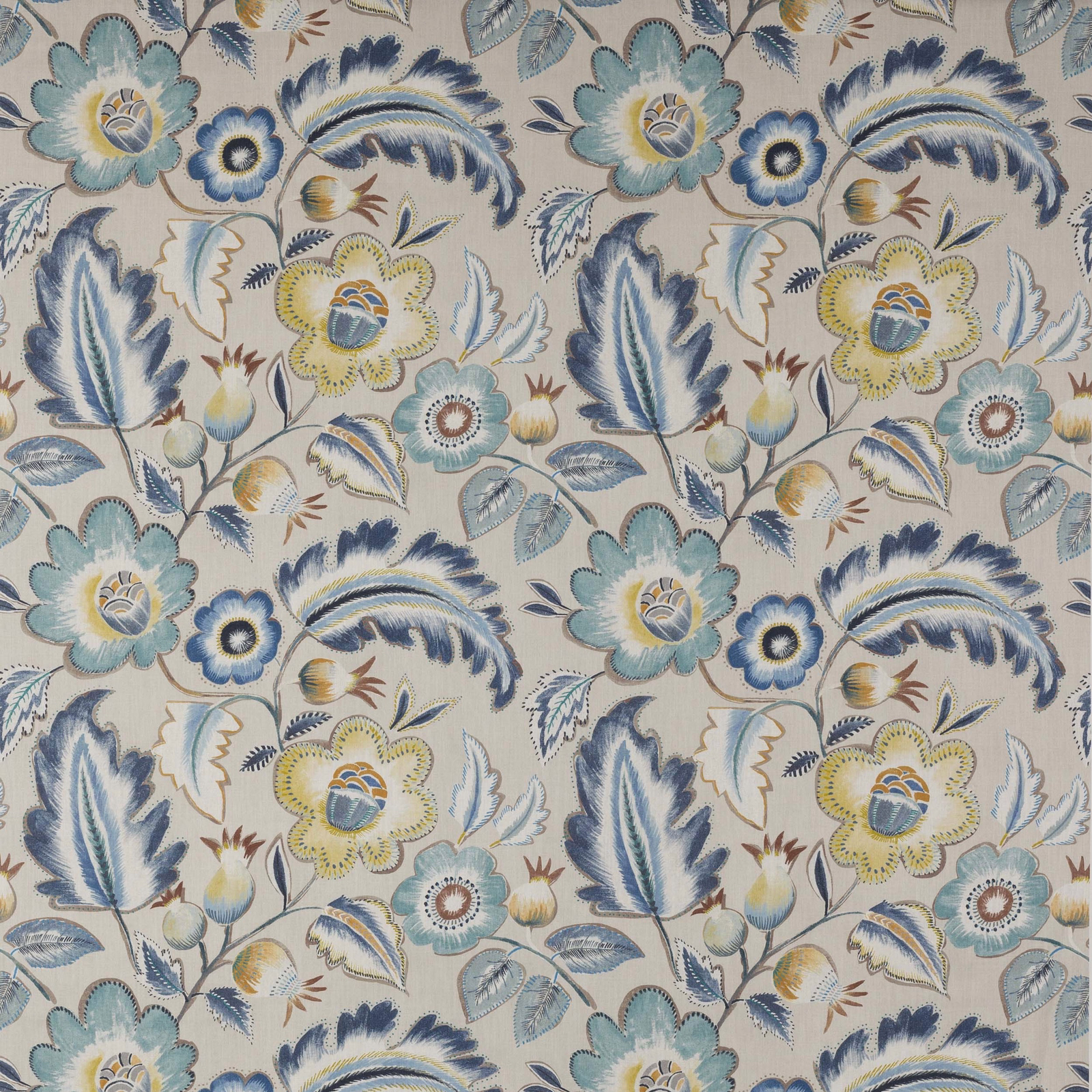 Large-scale botanical floral fabric with navy, blue, teal and ochre details on a pale ground