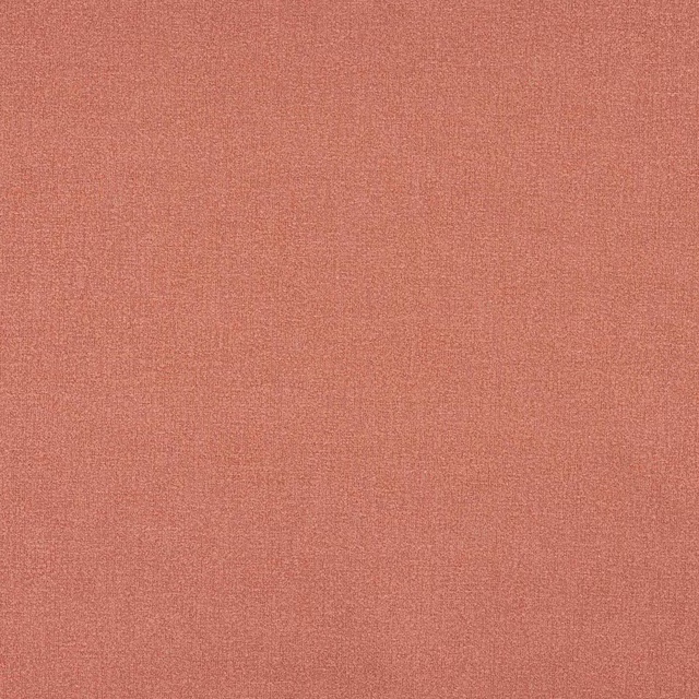 Close-up of a soft dusty pink plain weave fabric with fine texture