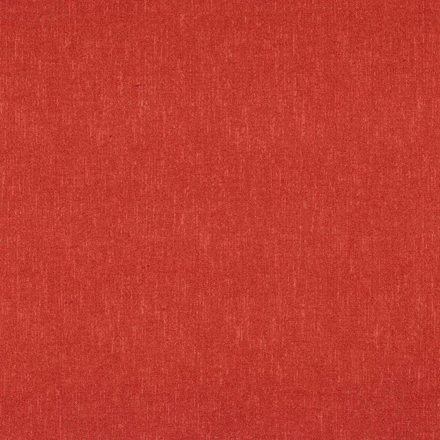 Close-up of warm coral-red plain weave fabric with fine slub texture