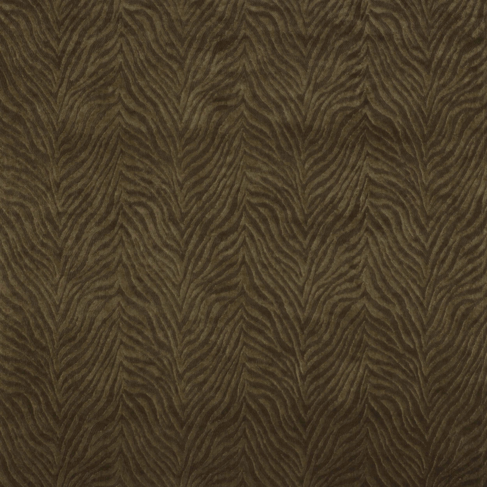 Close-up of warm chocolate-brown Kuba fabric with textured leaf-like woven motif