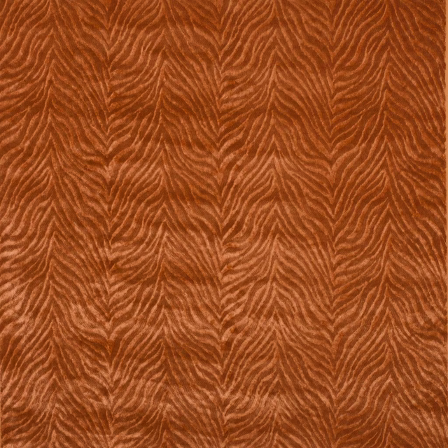 Terracotta woven fabric with leaf-like zigzag texture and subtle sheen