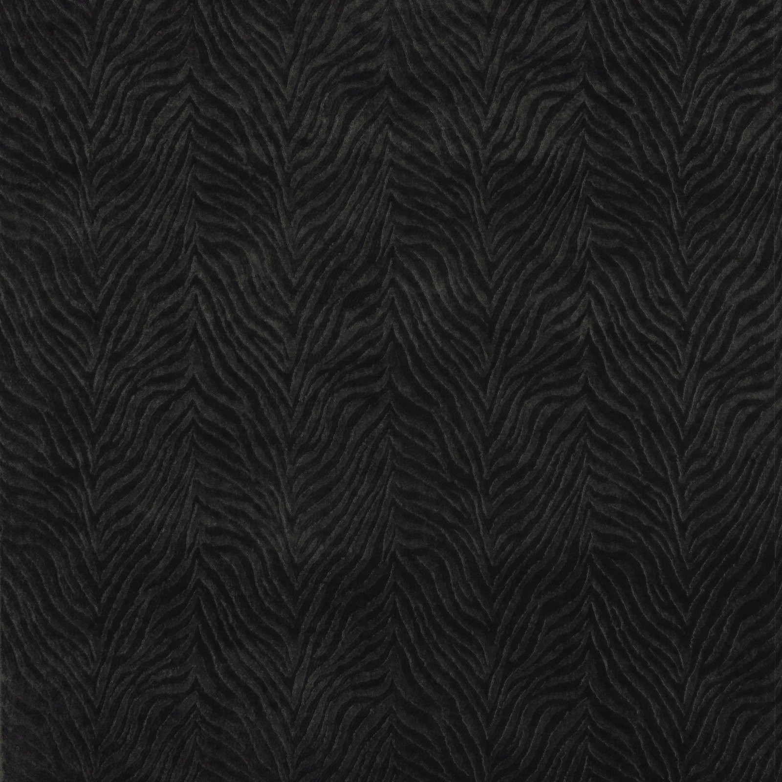 Dark blue textured woven fabric with a rippling chevron pattern