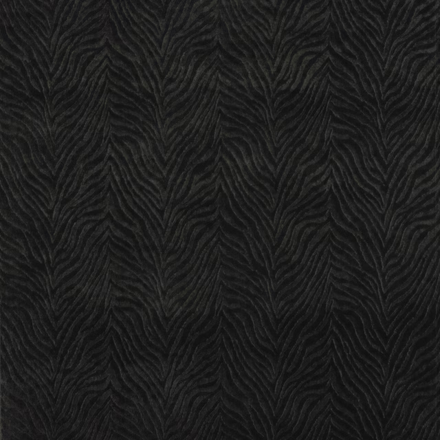 Dark blue textured woven fabric with a rippling chevron pattern