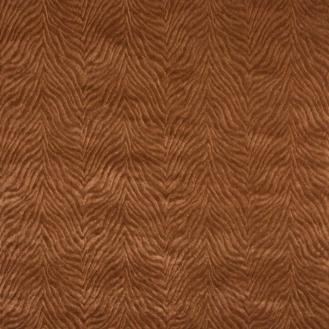 Close-up of warm wood-brown Kuba fabric with a raised vertical chevron weave