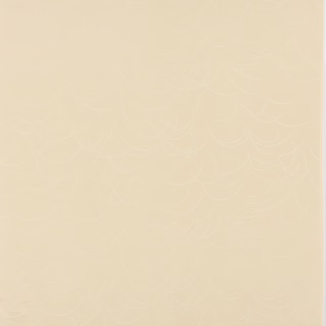 Pale ivory cream fabric swatch with a subtle scalloped woven motif