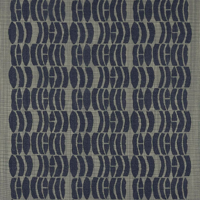 Sample of navy geometric motif on a muted grey-green textured ground