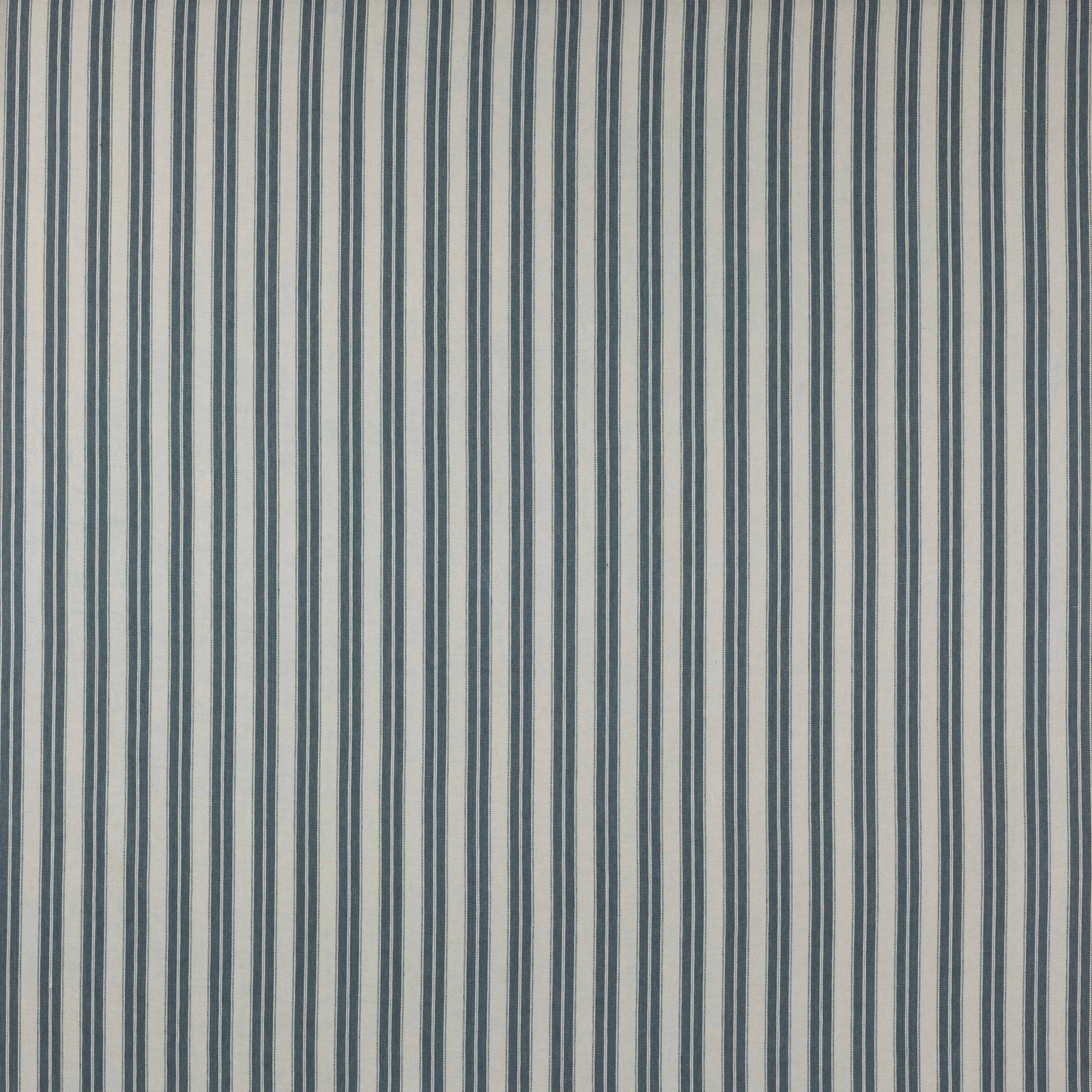 Vertical blue and pale striped linen swatch with fine woven texture