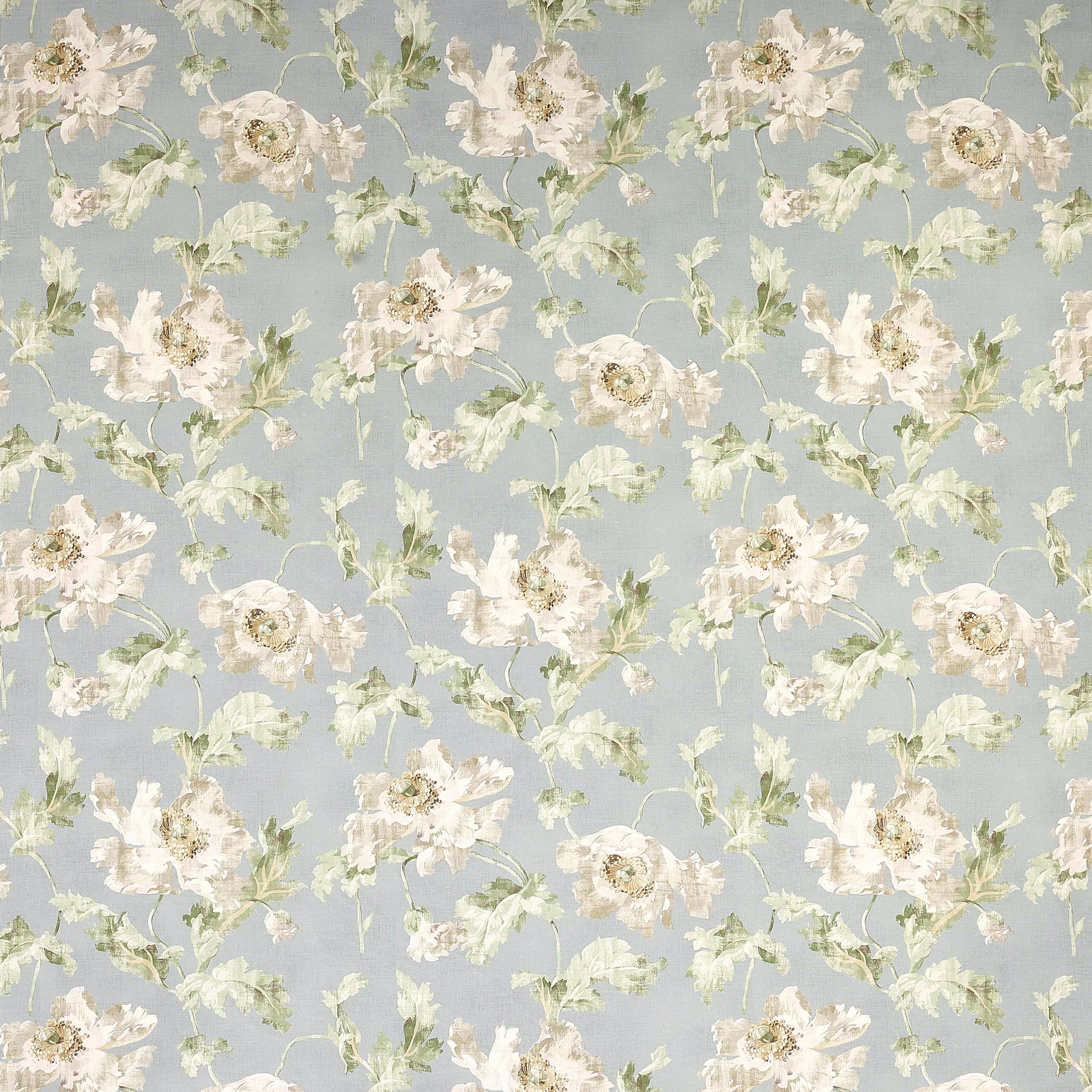 Pale blue floral fabric with cream blossoms and soft green leaves
