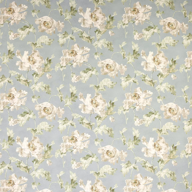 Pale blue floral fabric with cream blossoms and soft green leaves