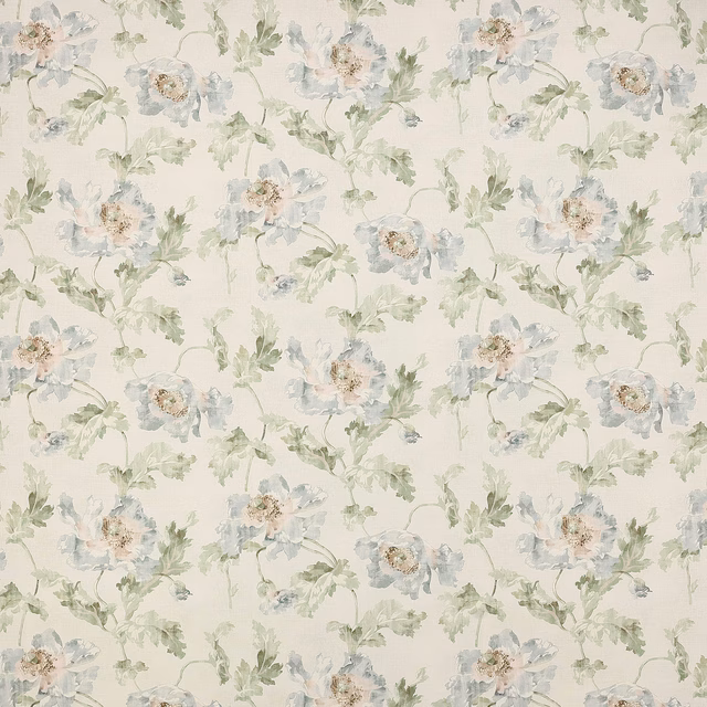 Pale blue and sage floral fabric on a creamy ground, with soft painterly blooms