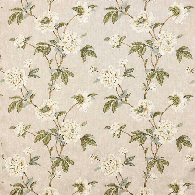 Ivory floral fabric with soft green leaves and cream blossoms on a linen-textured ground