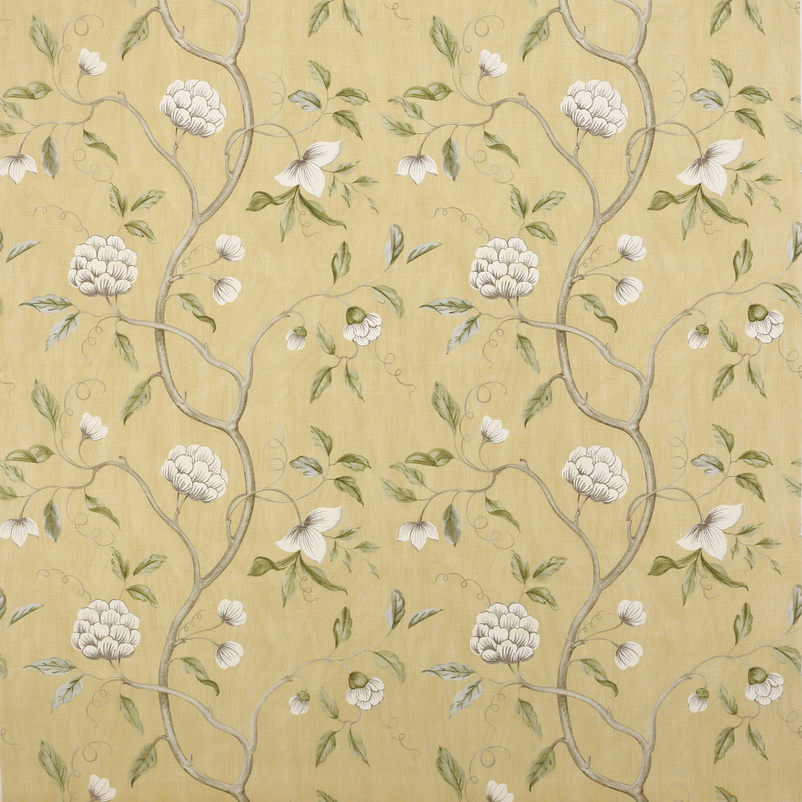 Soft yellow linen fabric with trailing floral branches and white blossoms