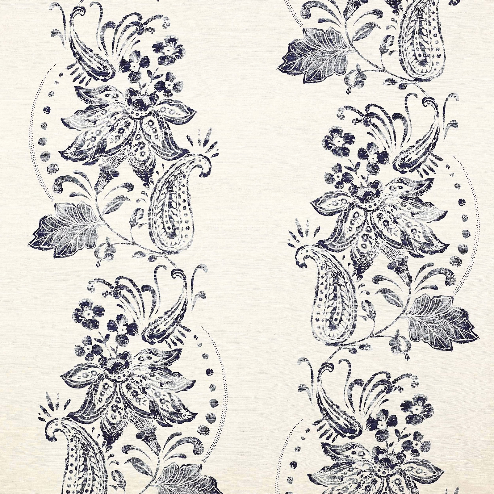 Navy floral paisley motif on a pale ivory woven fabric swatch