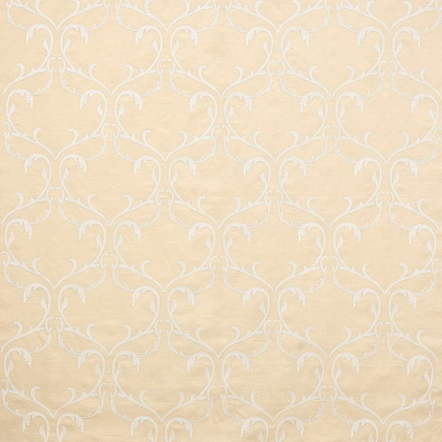 Creamy beige damask fabric with scrolling ivory pattern and subtle woven sheen